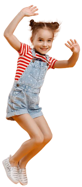 girl with red striped shirt and overalls jumping in the air